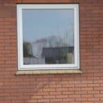 Tophængte pvc vinduer udskiftet i murstenhus på Sjælland